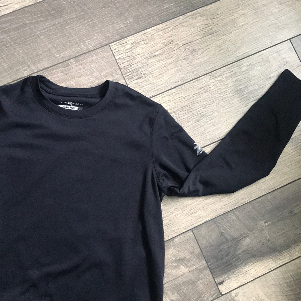 Boys lined Zero Xposur Dri-Tech top. Size large